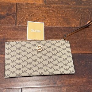 Michael Kors Tan and Brown Monogram Clutch